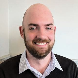 Headshot of Dr. Joshua Wyman, Registered Psychologist specializing in child and youth therapy at Dr. Sala & Associates.